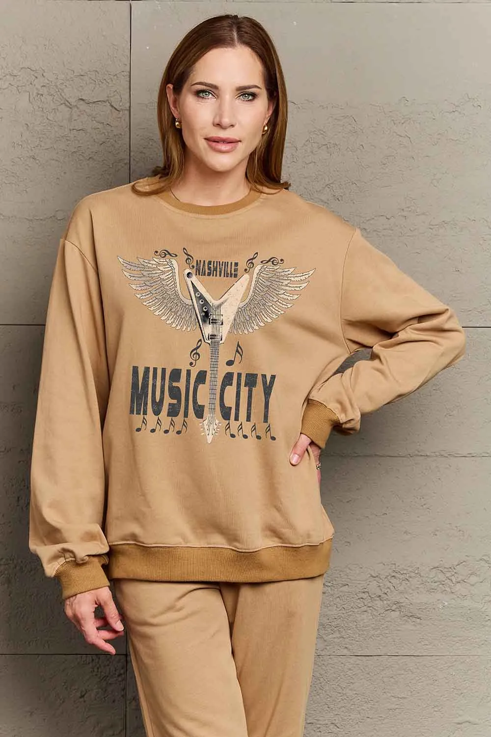 Round Neck Dropped Shoulder MUSIC CITY Graphic Sweatshirt